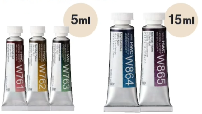Five tubes of the new Nightfall paints by Holbein are displayed in a row. Nightfall Blue and Violet are available in 15mL tubes, and the rest are only available in 5mL tubes.